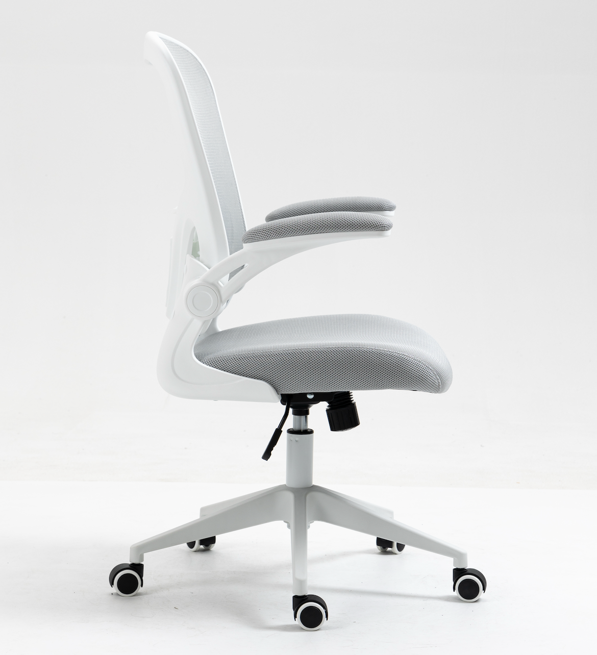 Silla SIT Ejecutiva, respaldar medio, superficie de nylon, reposabrazos ajustables. Color Negro y Gris. Peso: 200Lbs. SIT-M250