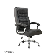 Silla SIT Gerencial, vinil sintético, reposa brazos acolchonados, reposa cabeza, soporte lumbar. Color Negro. Peso: 270Lbs. SIT-M895